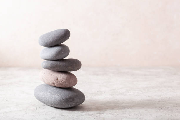 istock spa stones massage relax treatment 1178347043