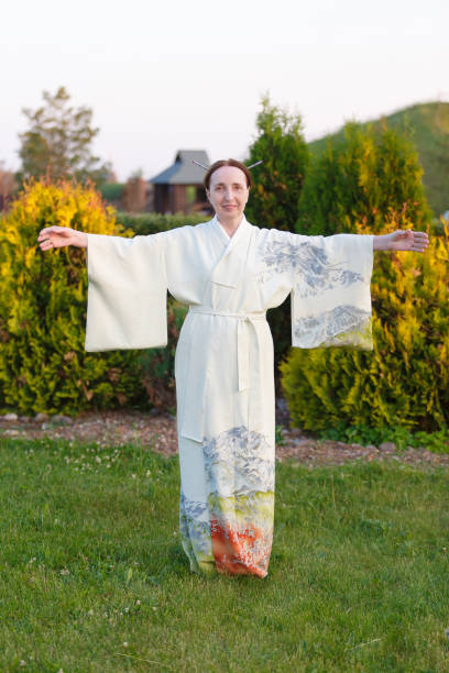 istock Elderly pretty woman in a white kimono 1178347046