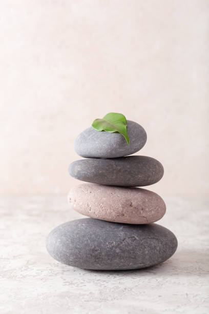 istock spa stones massage relax treatment 1178347255