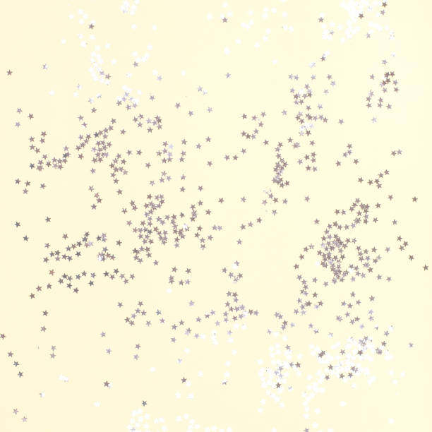 istock Yellow background with many small silver stars. 1178348790