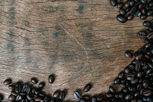istock Roast coffee bean on wooden table frame with copy space 1178351997