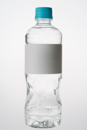 Water bottle with blank label isolated on white background.