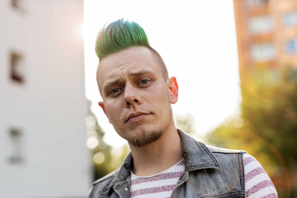 istock Young punk man in a public housing estates 1178354301