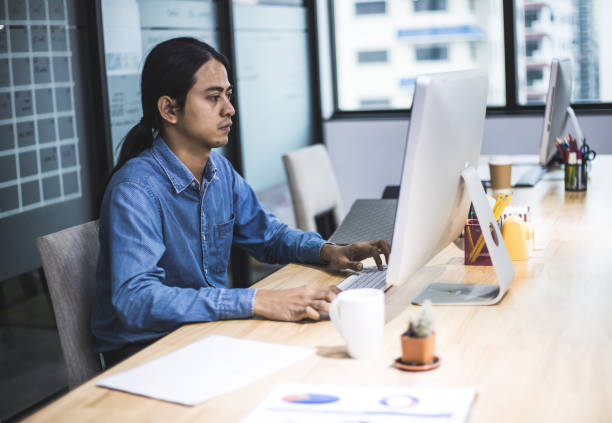 istock Close-up business man working on desk in the office 1178355414