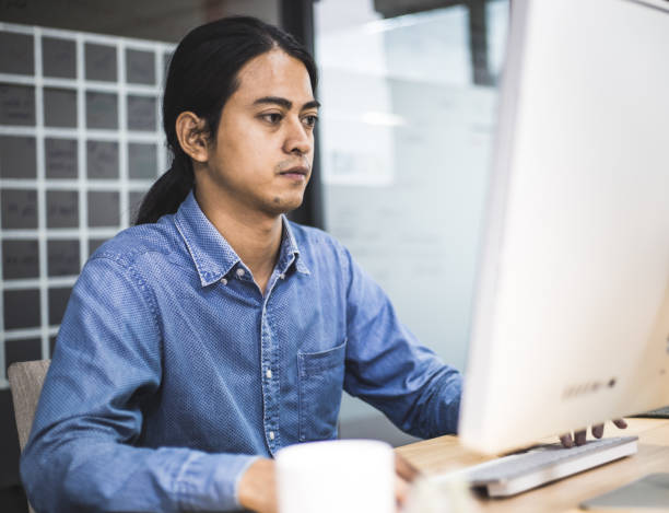 istock Close-up business man working on desk in the office 1178355423