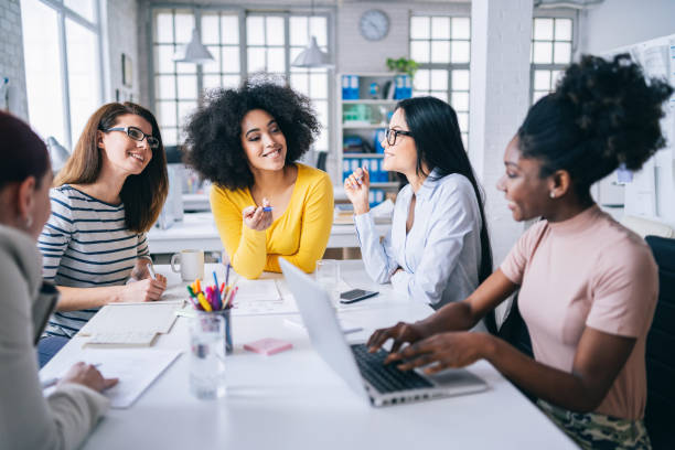 istock Multi-Ethnic women business team having discussion new projects 1178356654