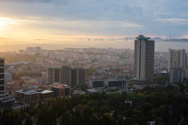 istock Misty sunrise over the city 1178360354