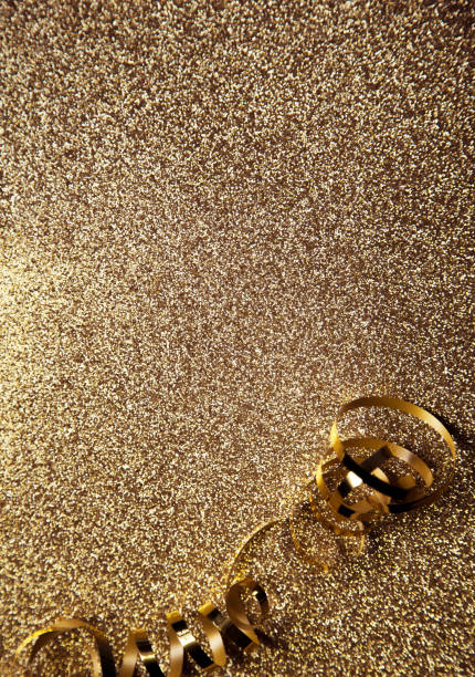 Gold background with golden curled ribbon strip