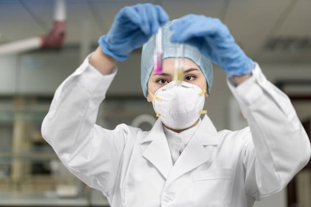 istock Female scientist looking at the scientific sample in the laboratory. 1178363666