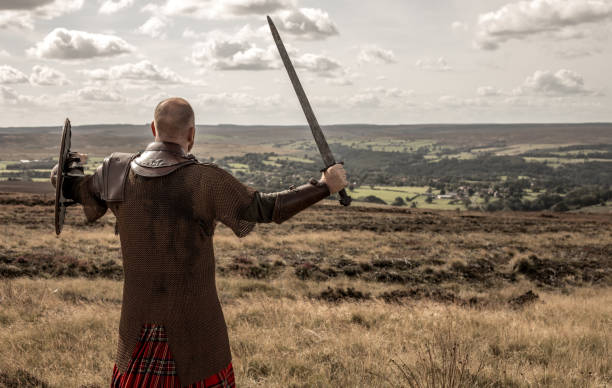 istock Scottish Redhead Warrior wearing a kilt 1178364472