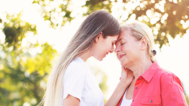 istock Smiling mother with young daughter 1178364867
