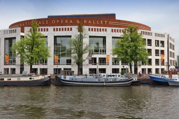 Modern Amsterdam Stopera building in Amsterdam, Netherlands. Stopera houses the City Hall, as well as Dutch National Opera, Dutch National Ballet and Holland Symfonia. stopera stock pictures, royalty-free photos & images