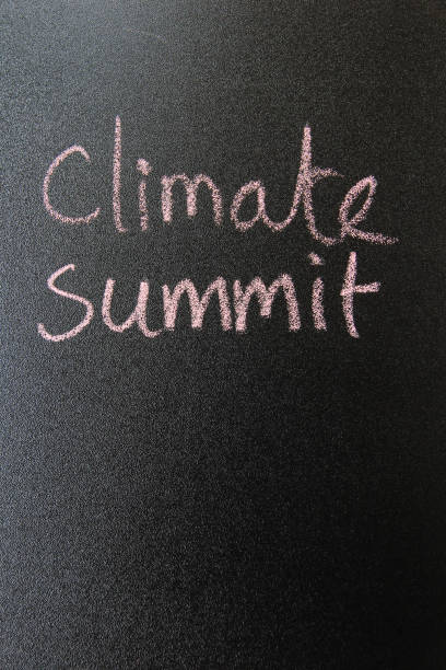 istock Climate change concept writing and drawing on blackboard for learning. 1178369001