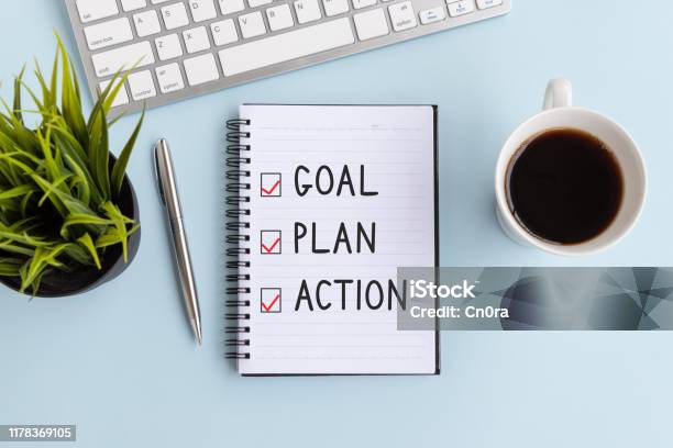 Goal Plan And Action Text On Notepad Stock Photo - Download Image Now - Planning, Business, Plan - Document