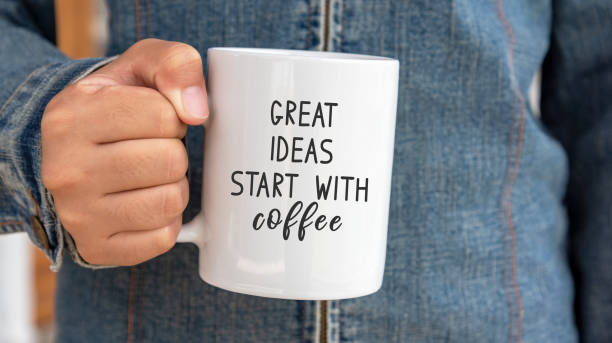 istock Inspirational quote on coffee mug - Great ideas start with coffee. 1178369108