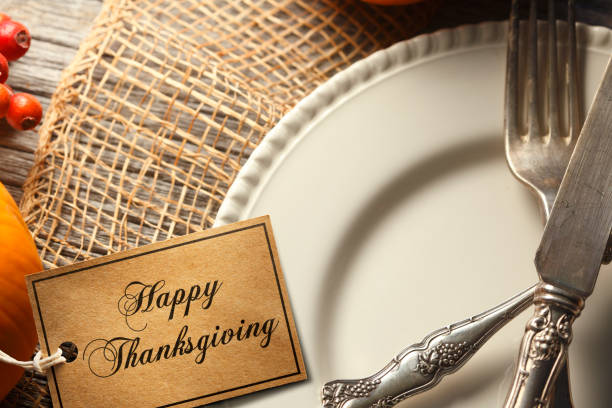 istock Happy Thanksgiving Tag On A Thanksgiving Place Setting 1178371728