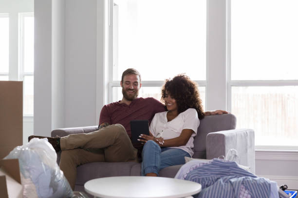 istock Happy expectant couple move into new home 1178376616
