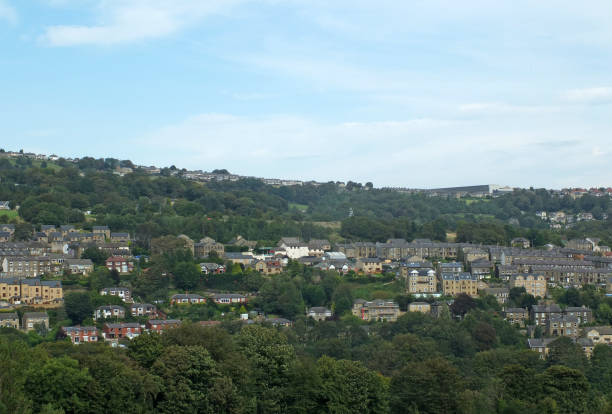 istock a panoramic view of sowerby bridge from above surrounded trees and a blue summer sky 1178378553