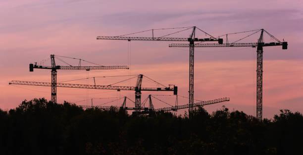 Many Construction Tower Cranes stock photo