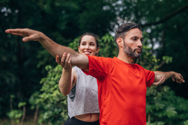 istock Couple exercising in nature 1178379647