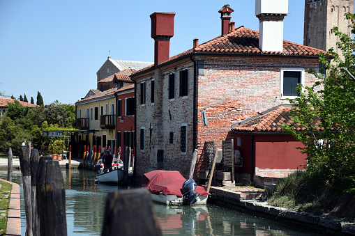 Torcello, Italy, 04.19.2019: Cityscape pictures of a sparsely populated island at the northern end of the Venetian Lagoon, it has been referred to as the parent island from which Venice was populated