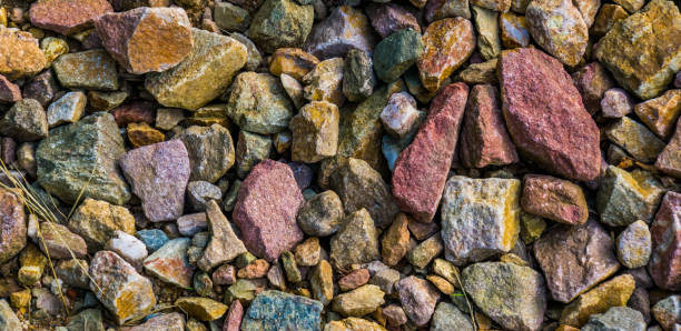 istock gravel stones in diverse colors in closeup, stone pattern background 1178392644