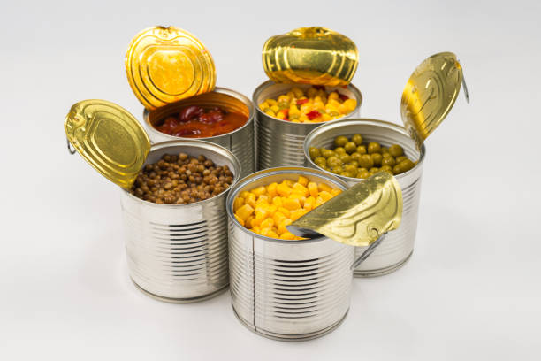 istock Canned food on white background. Green pea, beans, corn, lentils. 1178393089
