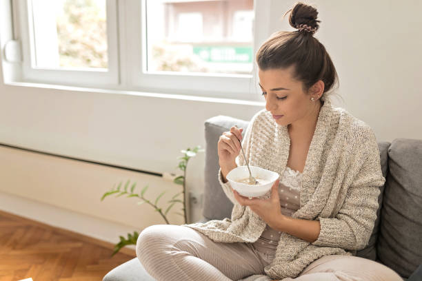 istock Woman eating an oatmeal 1178394570