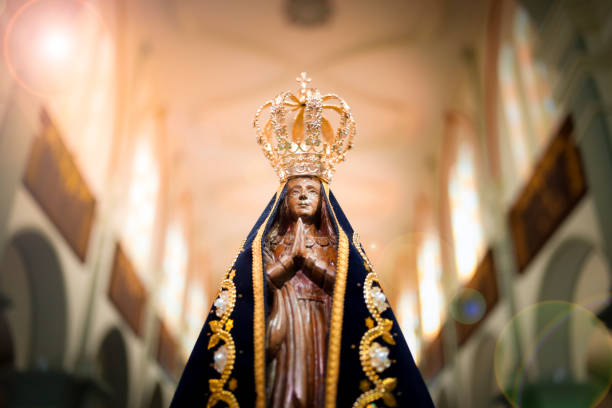 Image of Our Lady of Aparecida - Statue of the image of Our Lady of Aparecida Statue of the image of Our Lady of Aparecida, mother of God in the Catholic religion, patroness of Brazil crown headwear photos stock pictures, royalty-free photos & images