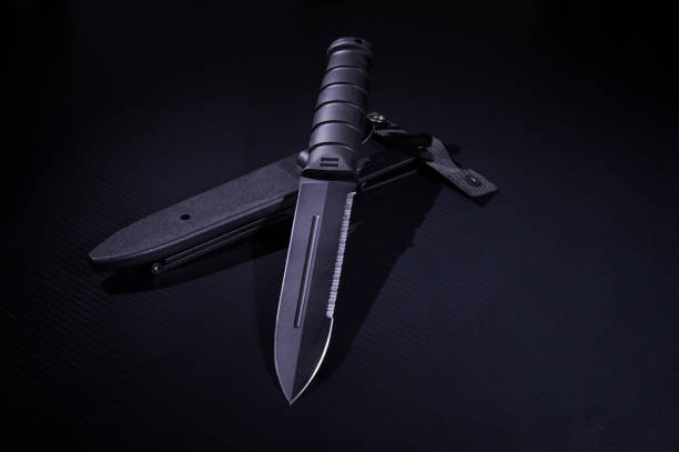 istock Black knife with a plastic sheath. Army knife. A sharp knife with a saw. 1178397626