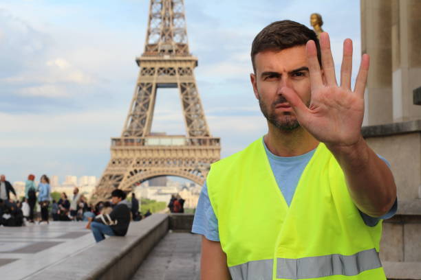 istock Man with yellow vest protesting in France 1178397650