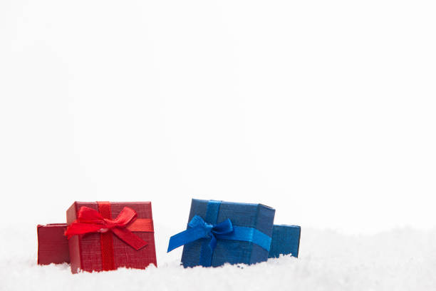 istock Christmas gifts with snow 1178406800