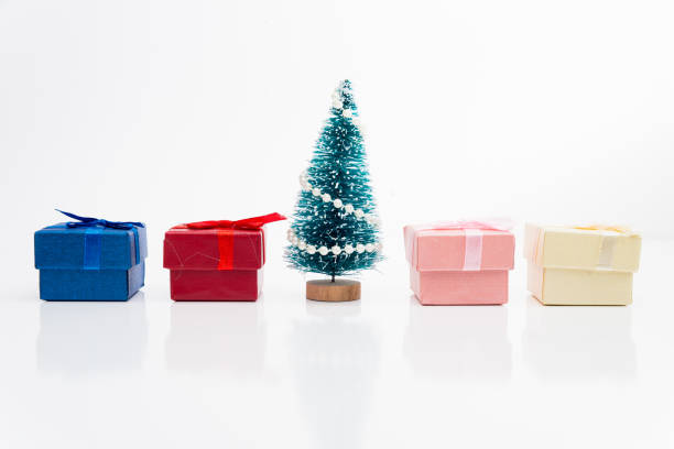istock Christmas tree with gifts on white background 1178406803