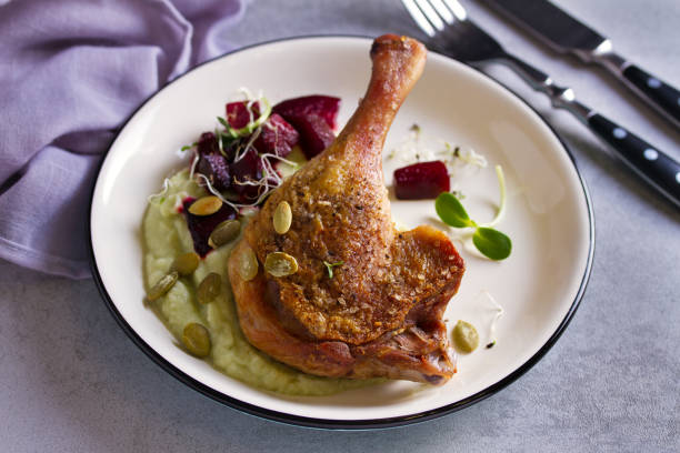 istock Roasted duck with celeriac puree and beetroot, sprinkled with pumpkin seeds 1178419386