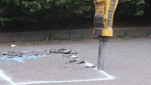 istock Construction worker repairing road with Jackhammer 1178420841