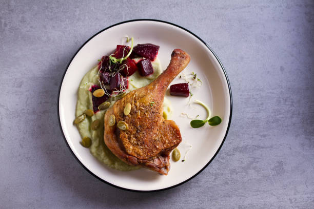 istock Roasted duck with celeriac puree and beetroot, sprinkled with pumpkin seeds 1178420912