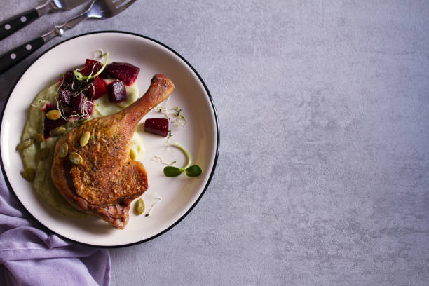 istock Roasted duck with celeriac puree and beetroot, sprinkled with pumpkin seeds 1178420983