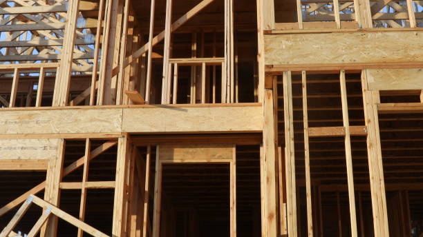 istock Wood home framing at construction site. 1178421088