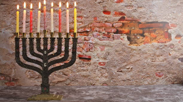 istock Menorah with candles for Hanukkah against defocused lights 1178421221