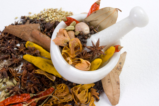 Chinese acupuncture treatment with needles, herbs and spice used in traditional natural herbal plant medicine remedies. Plant based healthcare concept.\