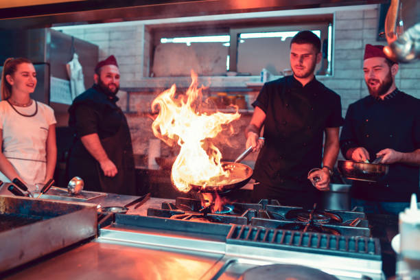 istock A Cook Playing With Exotic, Flaming Recipes 1178425491