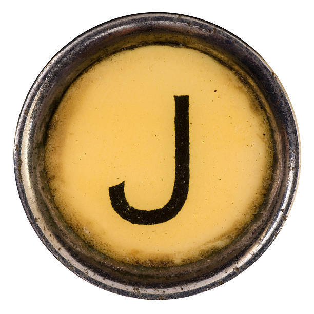 tecla j - letter j typescript old typewriter key fotografías e imágenes de stock
