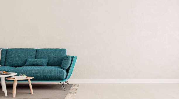 wohnzimmer innenwand mock-up mit blaublau sofa, leere weiße wand mit freiem platz auf der rechten seite, 3d-render, 3d-illustration - living room blue sofa carpet stock-fotos und bilder