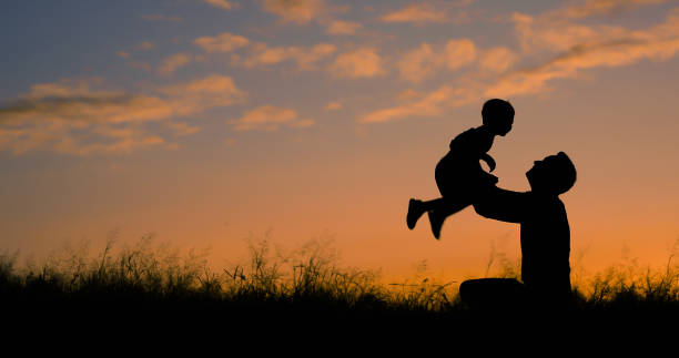 istock Father and son playing at sunset 1178431956