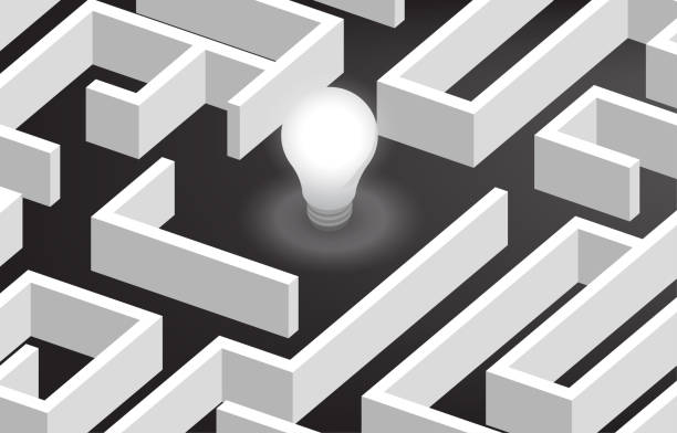 istock Glowing light bulb at center of maze . 1178440662