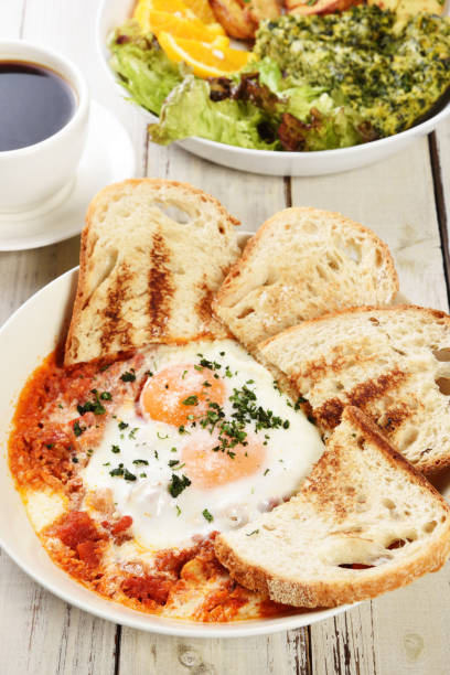 istock Sunny side up eggs with crsipy toasth 1178450615