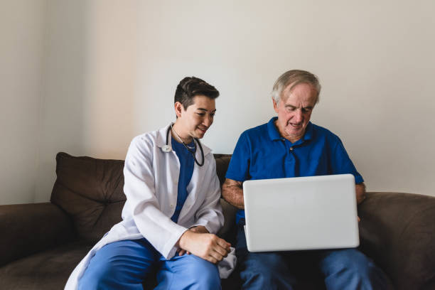 istock Caregiver helping senior with online shopping 1178451297