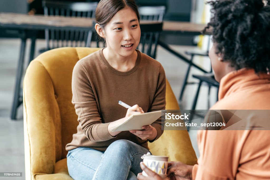 Discussing new marketing strategy Job interview Research Stock Photo