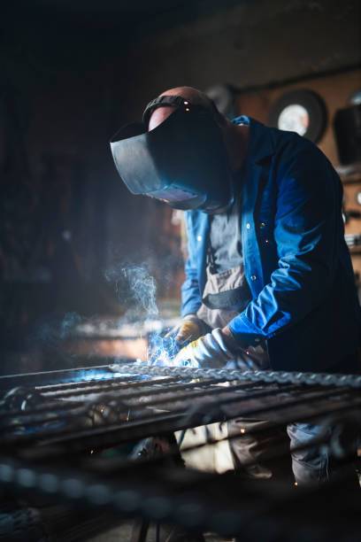 istock Welder Welding Metal In Workshop 1178451840