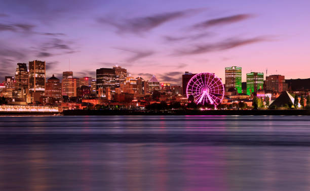 istock Montreal skyline illuminated at dusk reflected in Saint Lawrence River, Quebec 1178457541